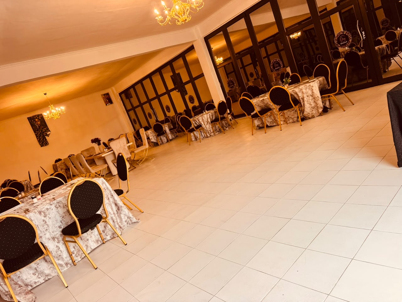 Banquet hall with mirrored doors at DreamWoods, Masvingo