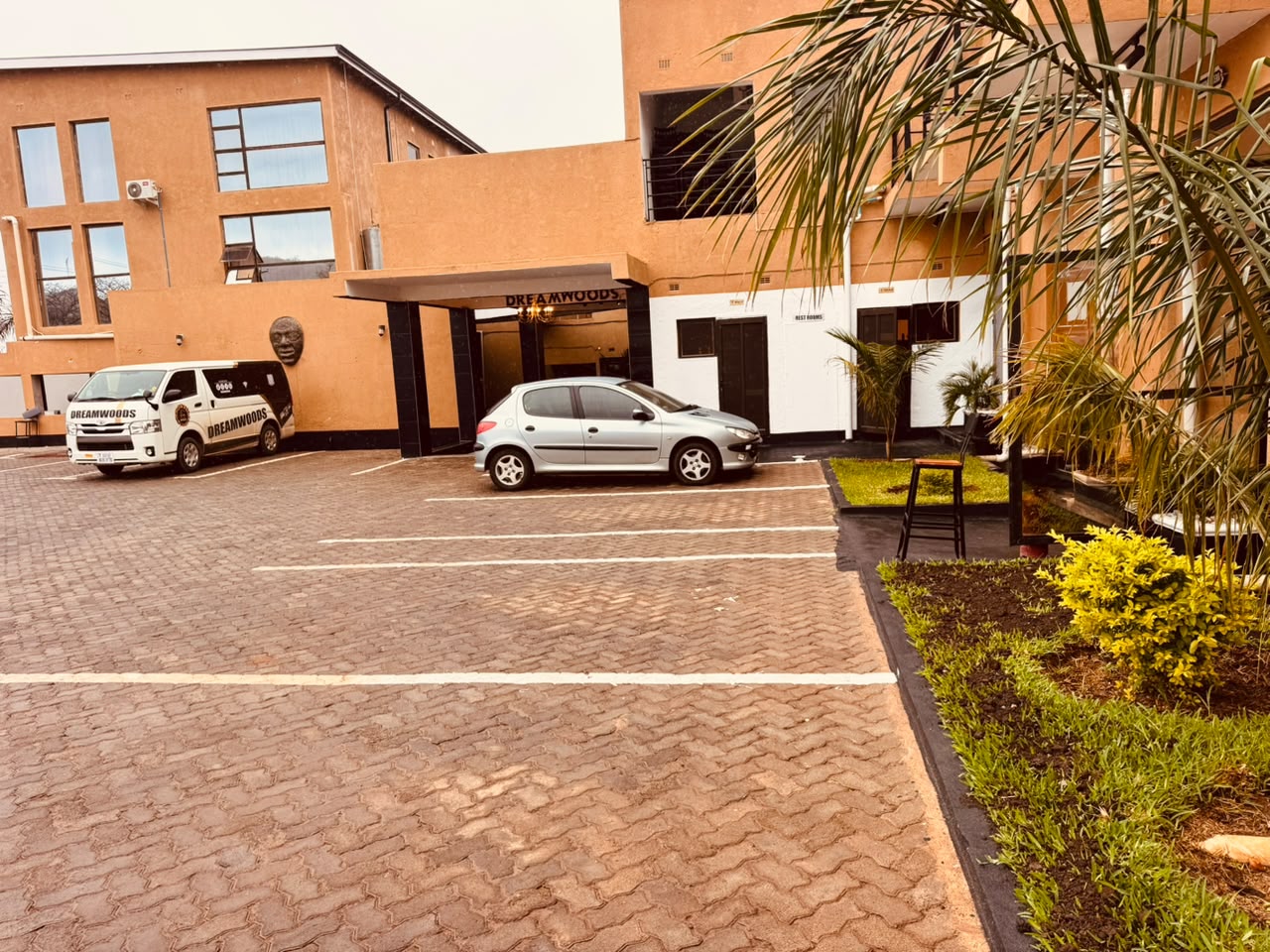 DreamWoods shuttle and gardens at the entrance in Masvingo